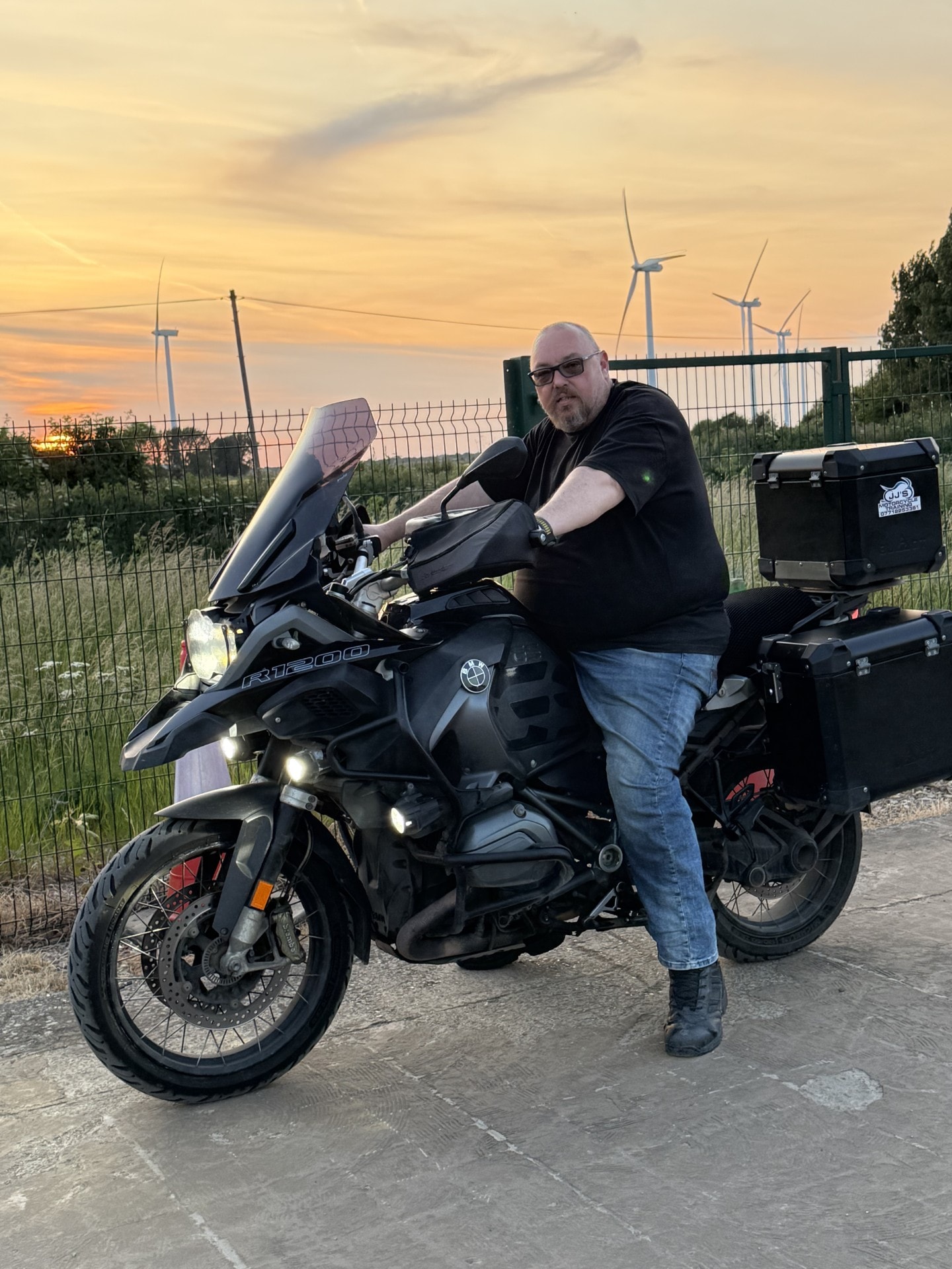 Instructor with BMW R1200 at sunset